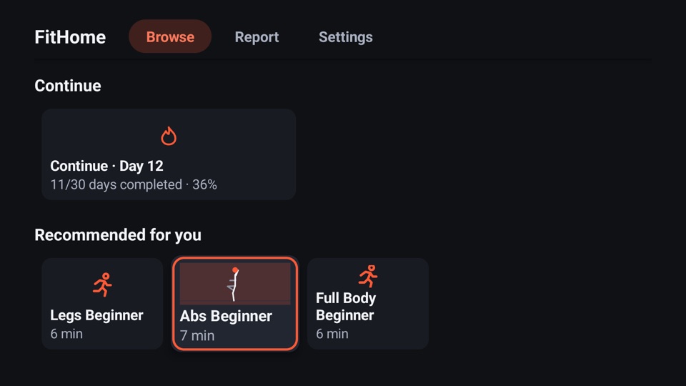FitHome's TV Browse screen with Continue · Day 12 at the top and Recommended for you below, with Abs Beginner highlighted