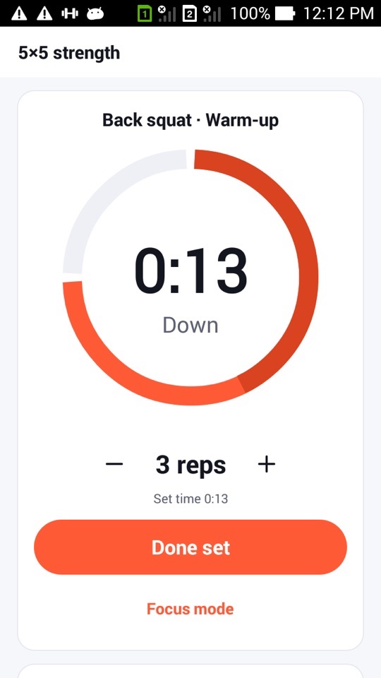 A back squat warm-up set running in FitHome, with a large ring timer at 0:13, the tempo phase "Down" and a count of 3 reps